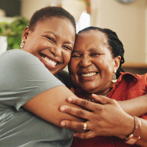 two people smiling