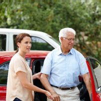 caregiver assisting senior