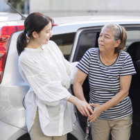 caregiver assisting senior