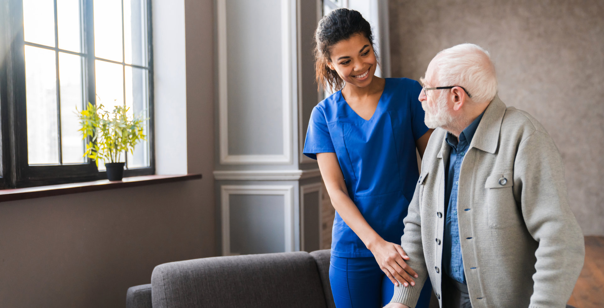 caregiver assisting senior
