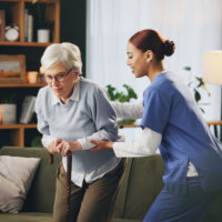 caregiver assisting senior