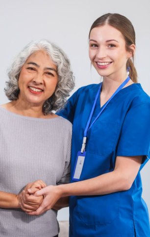 caregiver and senior woman smiling