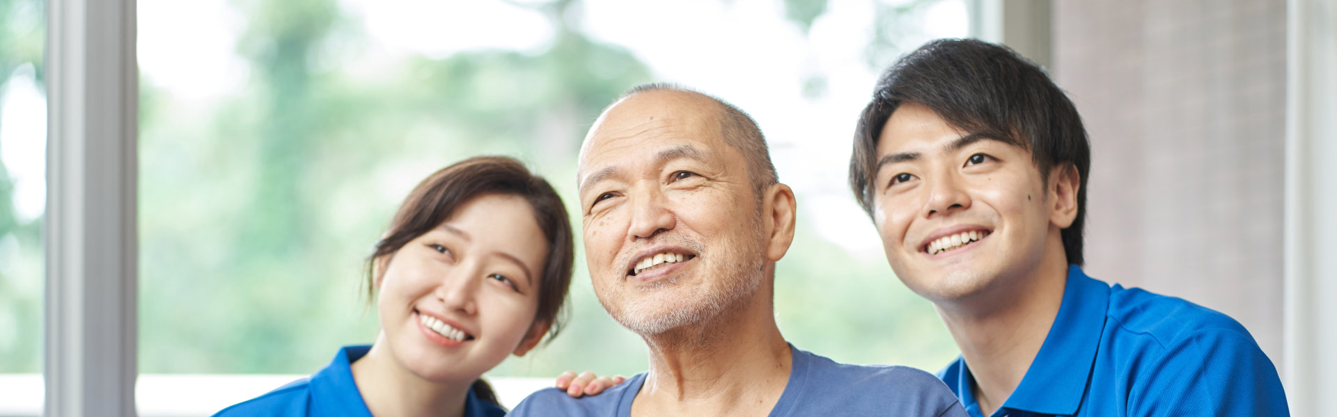 three person smiling